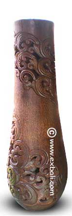 Carved palm vase