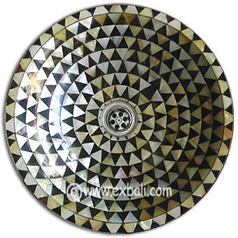 Yellow mother of pearl handbasin
